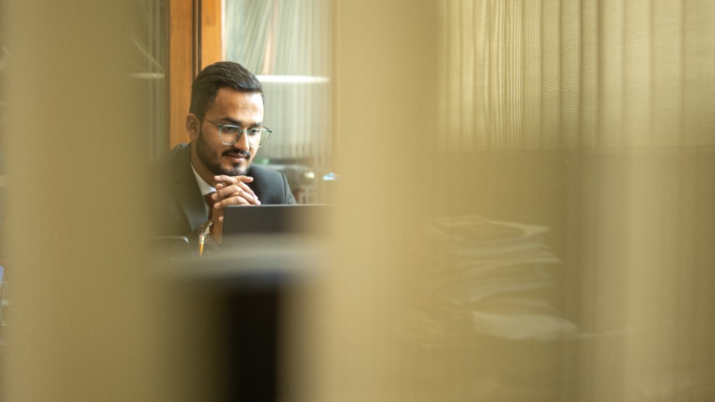 CA Anuj Singh reviewing work at his desk